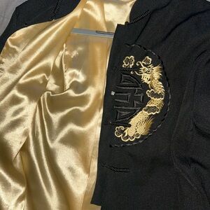 Luxurious Black and Gold Blazer with Satin Finish
